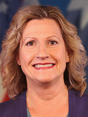 A photo of the commissioner's executive assistant Julie Forbord.