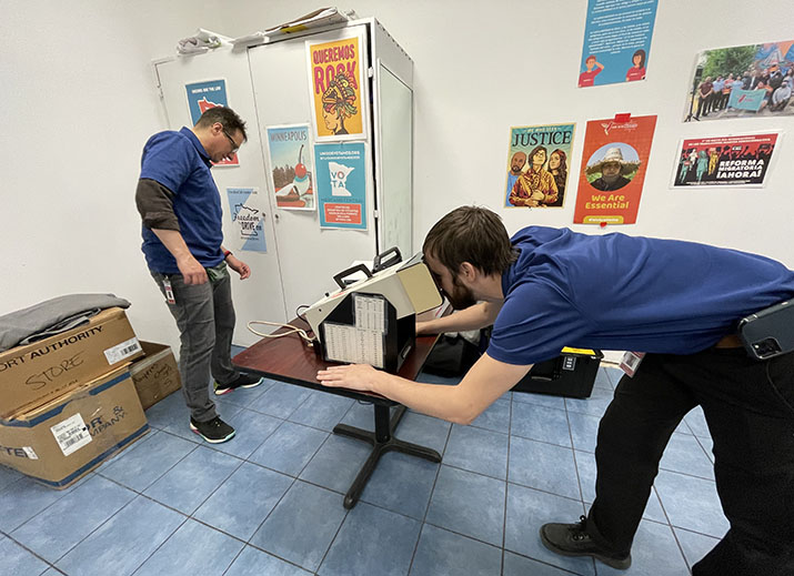 Driver and Vehicle Services staff set up an eye exam station during a town hall event