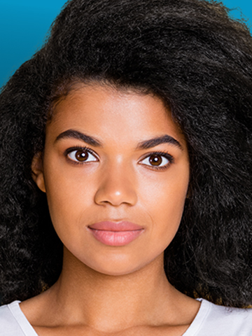 Full-face image of a young woman from the shoulders up and facing the camera. The photo meets the DVS standards for license and ID photos.