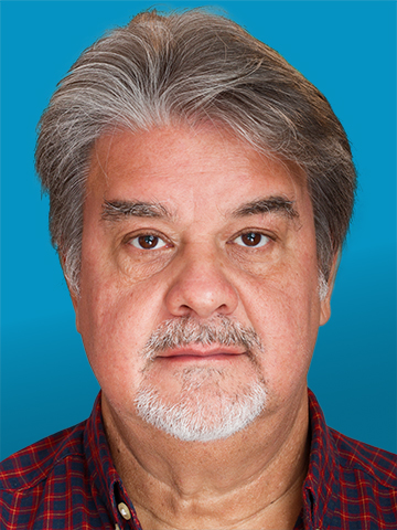Full-face image of a middle-aged man from the shoulders up and facing the camera. The photo meets the DVS standards for license and ID photos.
