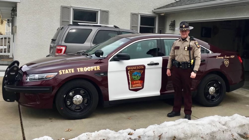 Sgt. Jim Lanoue poses in front of his squad early in his career
