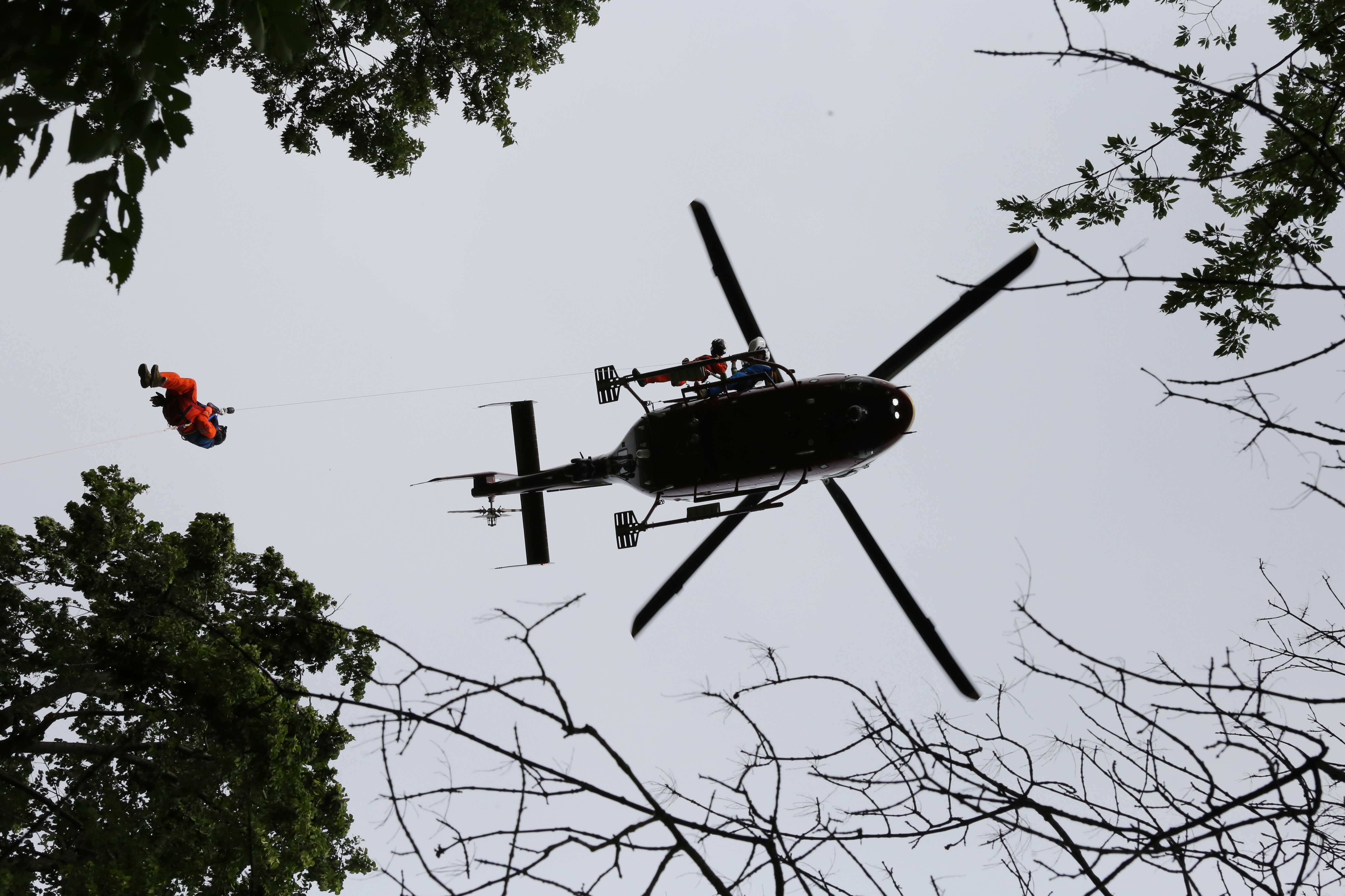 The Minnesota Air Rescue Team conducts rescue training using the new State Patrol helicopter's hoist system