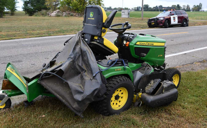 The wreckage of Kurt Lucking's riding lawnmower after he was hit by a driver