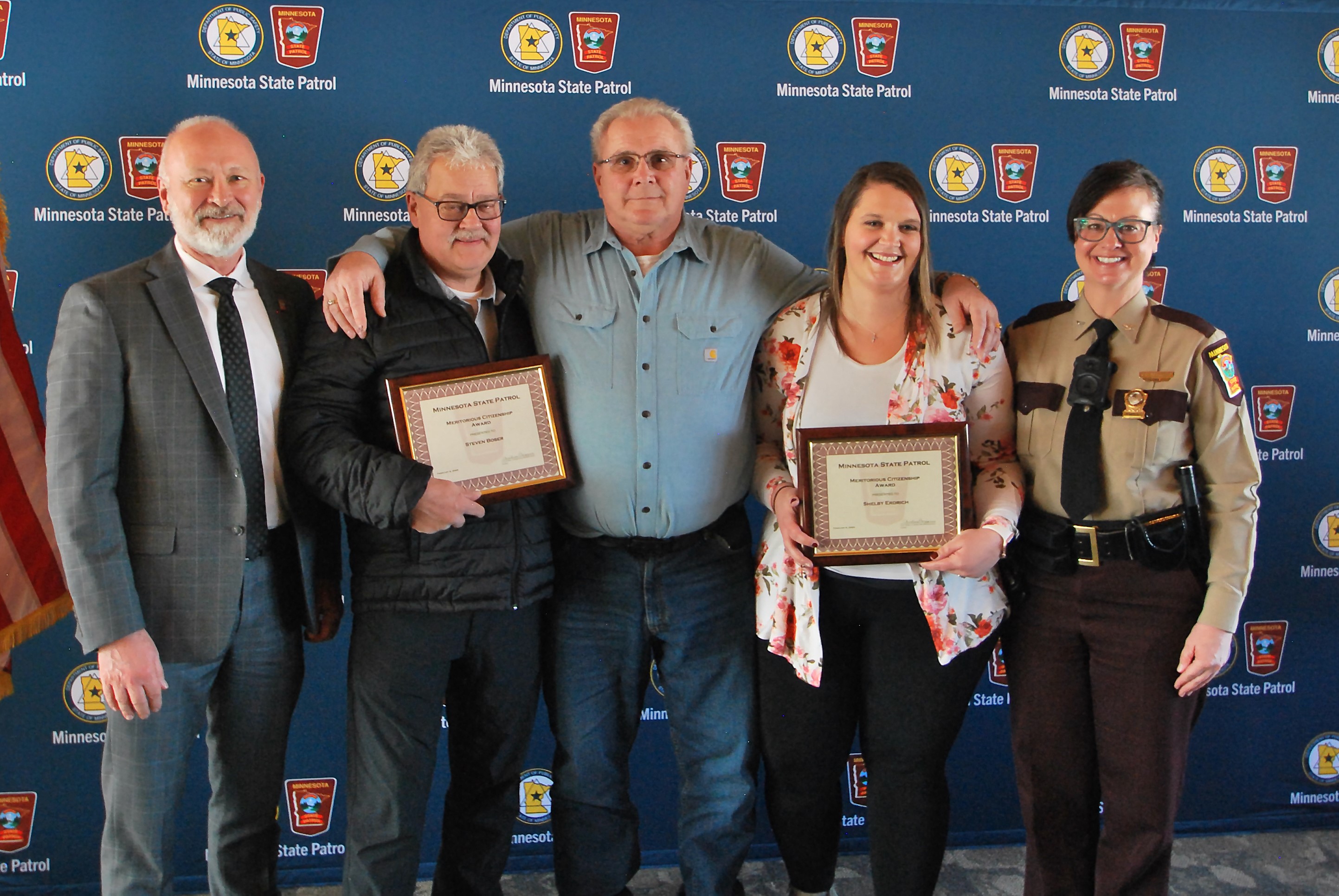 Pictured left to right: DPS Commissioner Bob Jacobson, Steven Boser, Kurt Lucking, Shelby Erdrich and Minnesota State Patrol Col. Christina Bogojevic