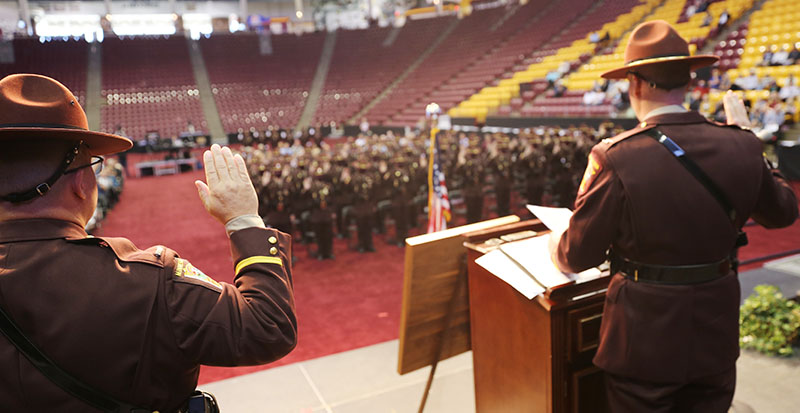 New troopers taking their oaths at graduation