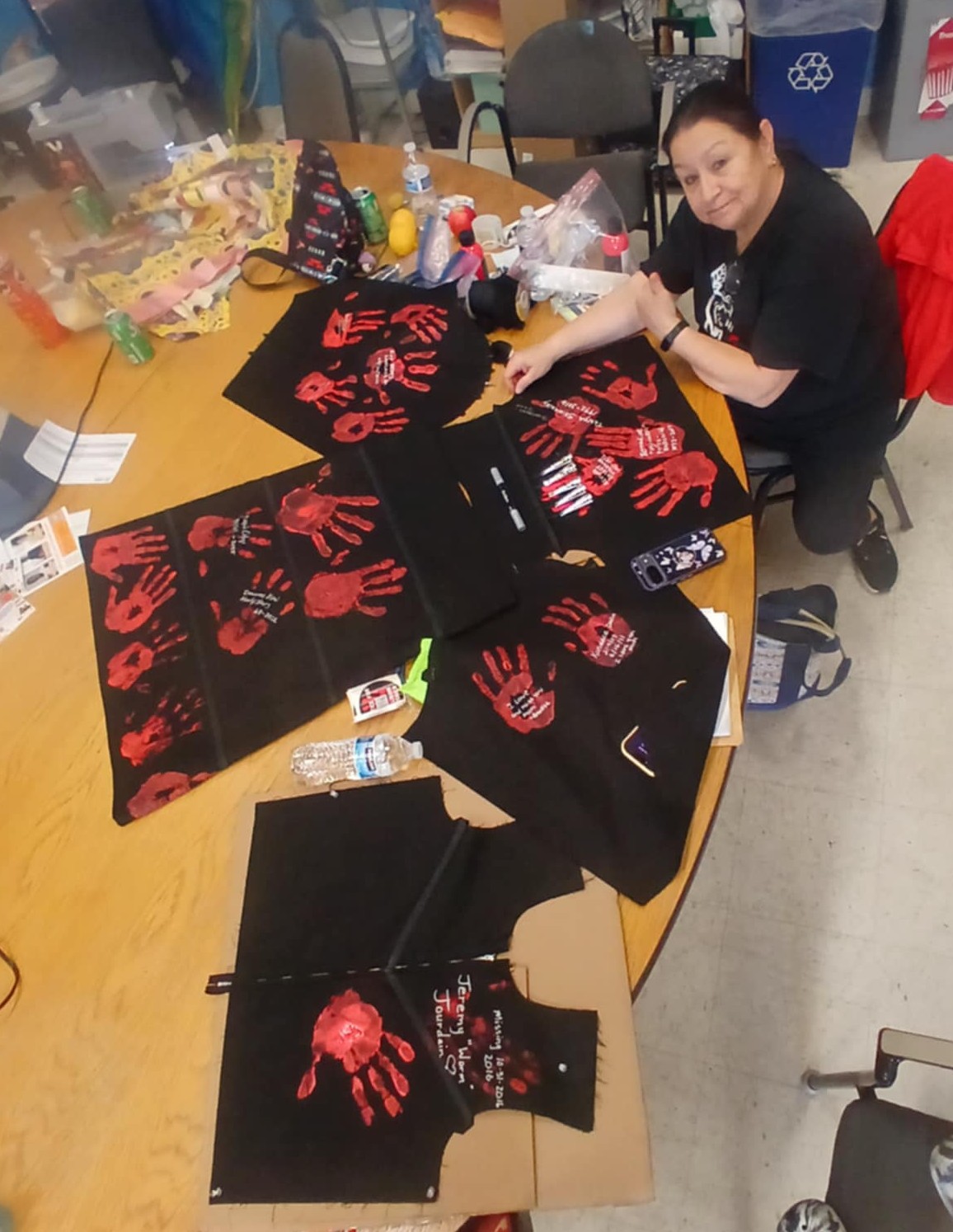 Anita Lovelace putting working on the jingle dress