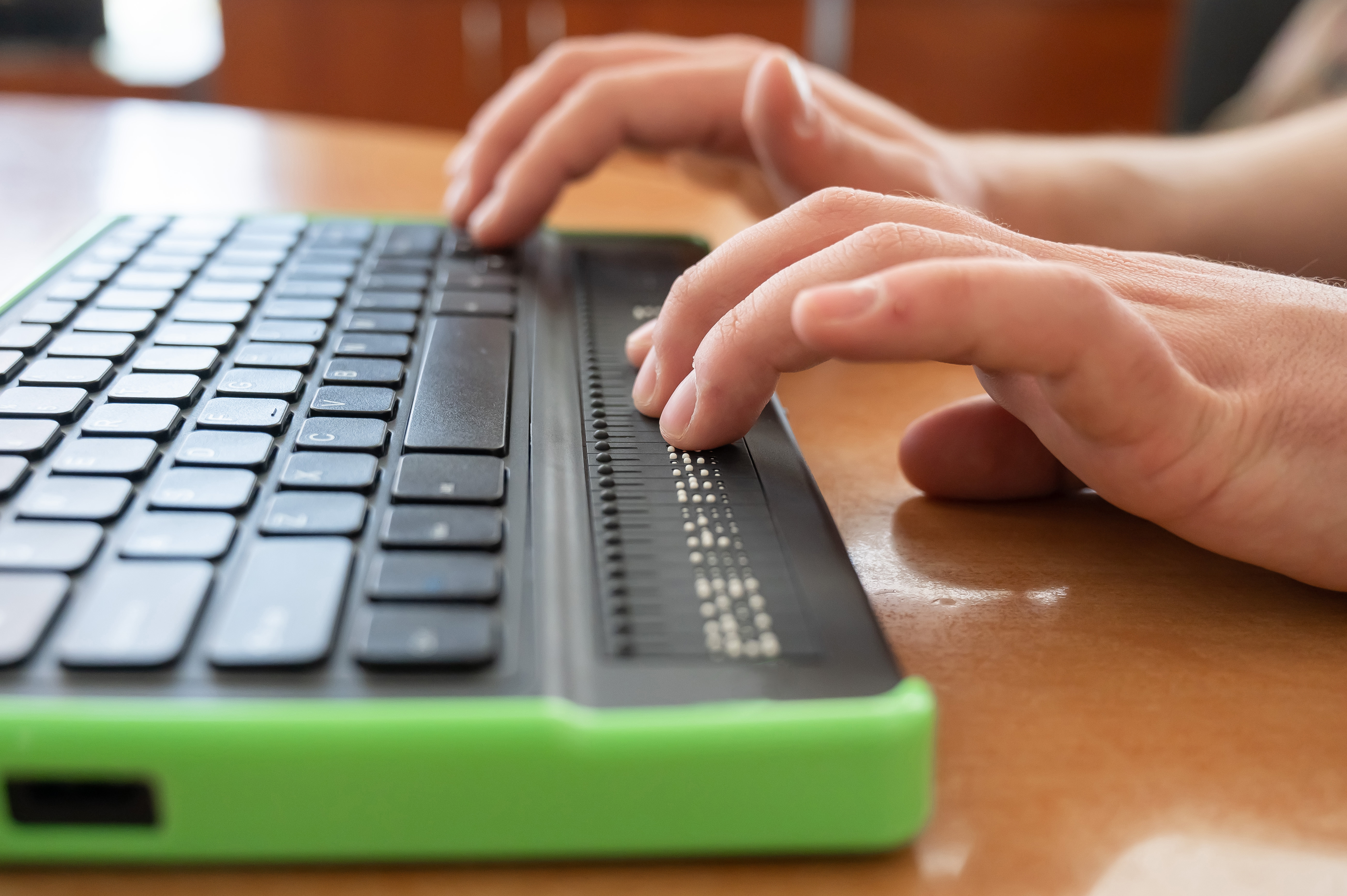 Hands on a Braille keyboard
