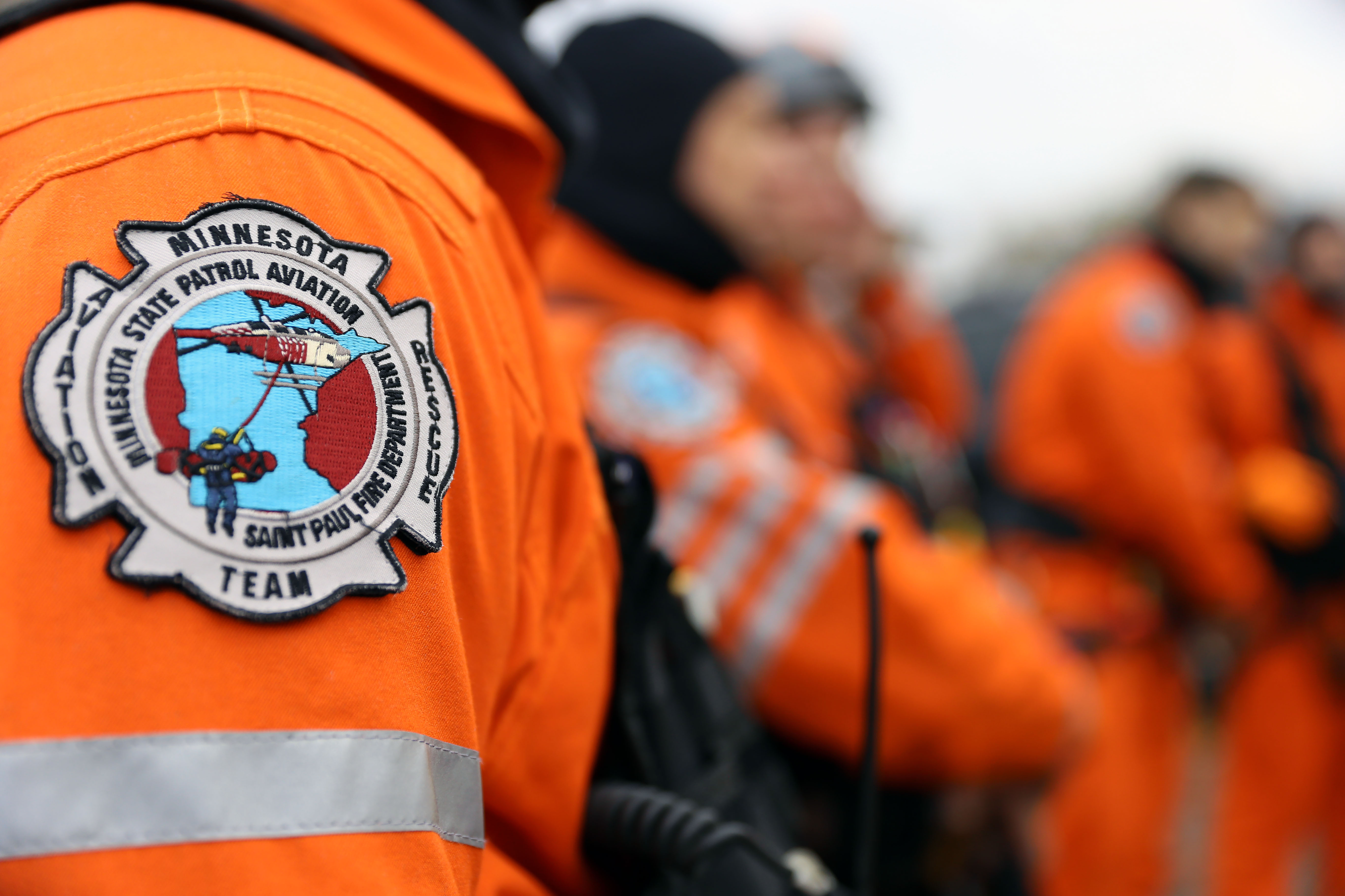 A photo of the Minnesota Air Rescue Team patch on an orange uniform.