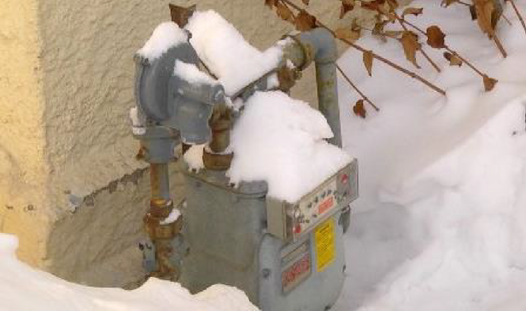Image of a gas meter covered in snow