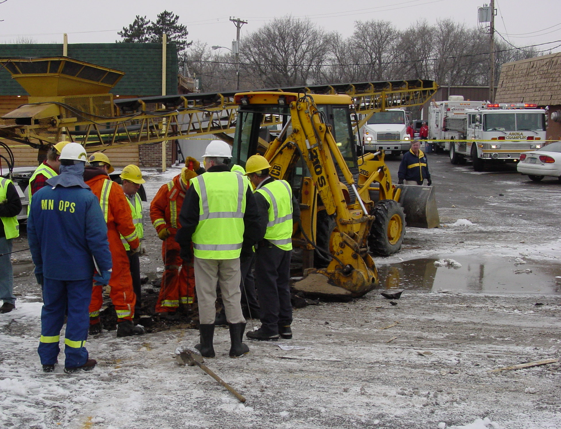 The image has an OPS inspector investigating an incident at an excavation site