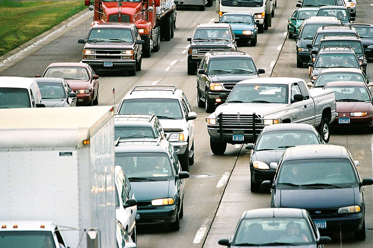 Three lanes of packed highway traffic