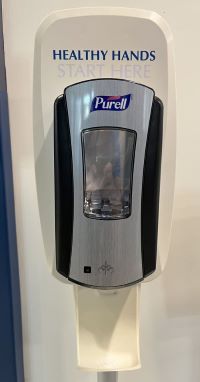 Alcohol based hand rub dispenser as seen in many stores and businesses and health care. 