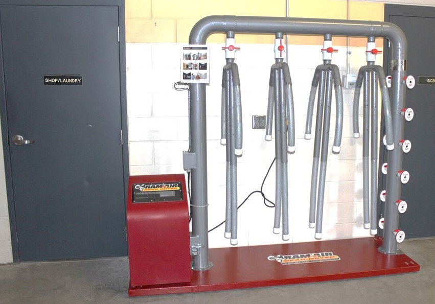 A fire department equipment washer and drier. 